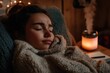 © Milos - A tranquil evening setting with a person wrapped in a cozy blanket, accompanied by an aromatherapy diffuser emitting relaxing steam beside them for utmost comfort and peace.