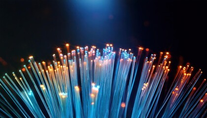 Close-up of glowing fiber optic cables in the dark