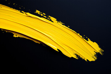 Wall Mural - bright yellow brush stroke of paint on black background