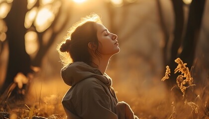 Serene meditation in nature illuminated by warm golden sunlight