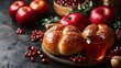 © Warakorn - A traditional holiday table with round challah, apples, honey, and pomegranates, representing a sweet and prosperous year ahead.