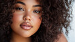 © Natalia Klenova - Close-up portrait of a young woman with curly hair