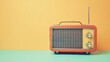 © Galib - An old-fashioned red radio on a mint and yellow background.