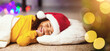 © Prostock-studio - Christmas time. Little african angel sleeping under Xmas tree, waiting for Santa Claus