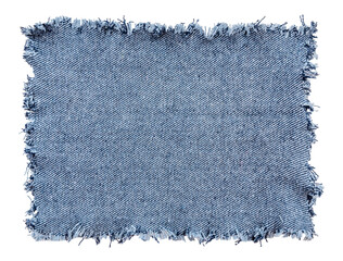 piece of torn denim on a white background. denim texture