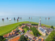 © Nataraj - Aerial from the town Hindeloopen during the sailing competition skutsjesilen on the IJsselmeer in the Netherlands