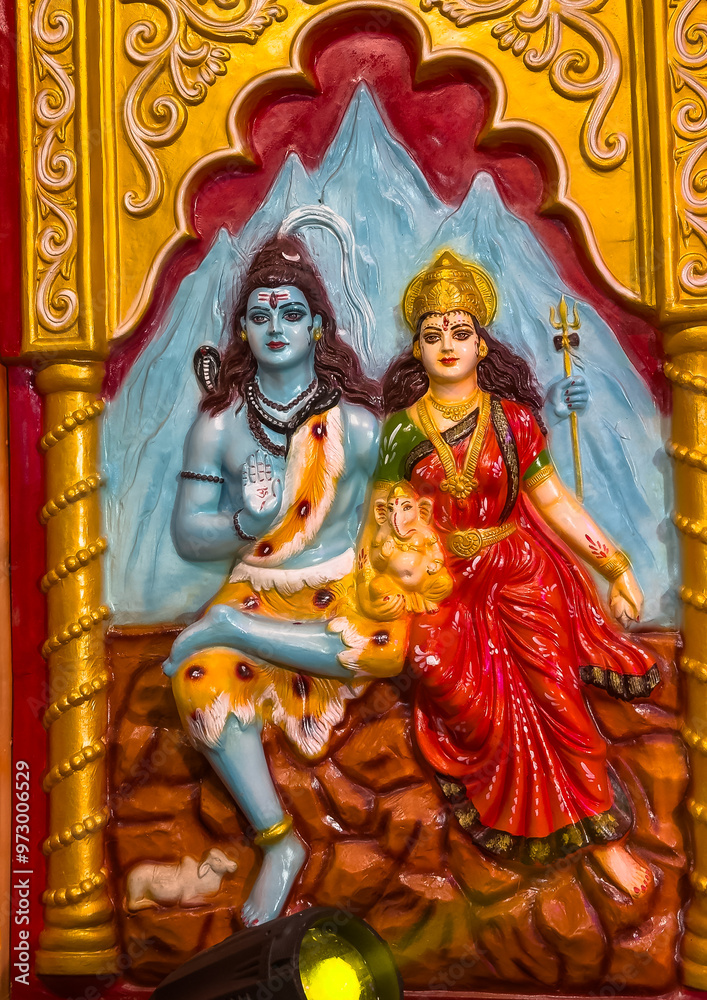 Colorful Sculpture Of Hindu God Shiv And Goddess Parvati At The Temple 