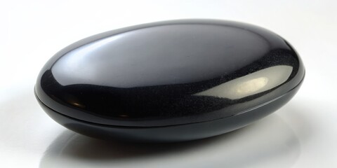 Aufkleber - Black stone with a smooth and polished surface, rock, texture, dark, nature, mineral, shiny, decorative, geology, natural