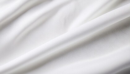 Wall Mural - Minimalist close-up of a white fabric with gentle folds, showcasing a soft texture and smooth surface, perfect for backgrounds or designs.