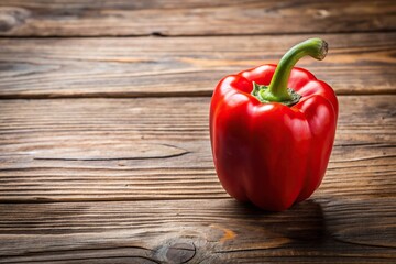 Fresh red pepper placed on rustic wooden table, ingredient, organic, healthy, cooking, vegetable