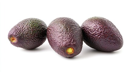 Canvas Print - Three ripe avocados arranged on a white background.