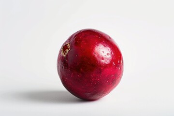 Poster - A single red apple placed on a clean white surface, perfect for still life photography or graphic design projects
