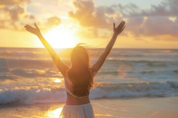 Poster - A woman stands alone on a beach as the sun sets in the background, creating a warm and peaceful atmosphere
