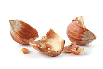 Poster - Two peeled nuts sit on a white surface, ready for use or decoration