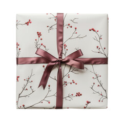 Elegant gift wrapped in stylish paper with berry designs and a beautiful ribbon, perfect for any celebration or occasion.