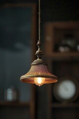 Poster - A close-up view of a light hanging from a ceiling, ideal for use in interior design or architectural photography