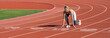 © Yevhen - Girl is trained at the beautiful stadium. Female runner training in summer day outdoors on the stadium. Runner woman in sportswear getting ready to run sprint at low start on stadium track