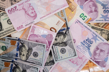 Poster - Assortment of Turkish Lira, Euro, and US Dollar banknotes in various denominations. Multinational currency exchange and global finance concept 