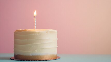 Modern minimalist cake with smooth white icing and a single lit candle, set against a pastel background