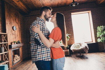 Canvas Print - Photo of happy young couple tender hugging kiss move new place enjoy live together have fun new apartment room light house flat indoor