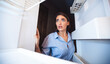 © Prostock-studio - Coronacrisis concept. Shocked girl looking at her empty fridge shelves in despair, view from inside