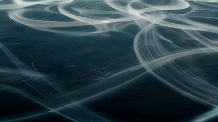 Aufkleber - Long exposure photograph capturing the movement of light, creating a dynamic and abstract composition of white trails against a dark background