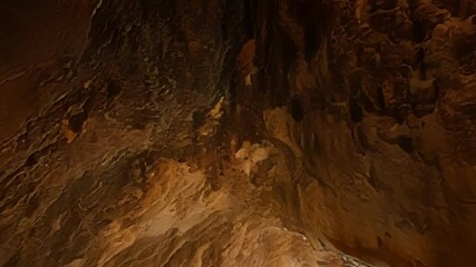 Poster - Rough texture of a rocky surface with craters illuminated by a warm light, creating a mysterious and desolate atmosphere reminiscent of mars