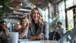 © bvbflo1 - Confident business woman in meeting with colleagues