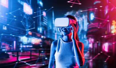 Wall Mural - Female standing in cyberpunk style building in meta wear VR headset connecting metaverse, future cyberspace community technology, Woman using hand holding goggles while looking faraway. Hallucination.