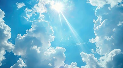 Wall Mural - Sunlight shines through clouds in a clear blue sky