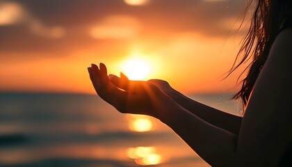 Gentle embrace of sunset lights held in female hands, evoking warmth and serenity