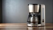 © lapeepon - A sleek and modern coffee maker perfect for brewing your morning cup of joe, coffee, maker, appliance, machine, brew, morning