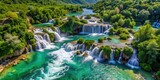 Aerial view of the stunning Krka Waterfalls in Krka National Park with turquoise water and lush greenery, Krka, Croatia