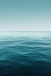 © EdvvinStudios - Ocean horizon stretching into distance under blue sky