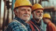 © sirisakboakaew - Elderly construction workers contributing to a construction project, showcasing experience and resilience