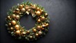 © Saksakon - Elegant Christmas wreath adorned with golden baubles and ribbons against dark background aerial