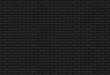 © Lawrey - Brick wall painted as black background texture in a seamless pattern for a dark backdrop