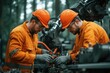 © Analogue - Two Skilled Professionals Collaborating on Machinery Repair under the Forest Canopy