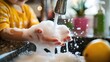 © Kitta Studio - A child washing hands with bubbly soap at a kitchen sink, showcasing cleanliness and joy in daily hygiene habits.