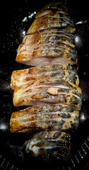 A closeup of a grilled mackerel fillet in a Japanese restaurant in Shanghai - enjoyable experience as always 