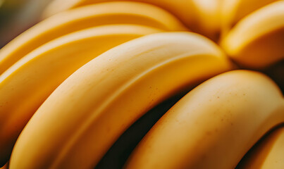 Close-up of yellow bananas, smooth, fresh, and ripe.