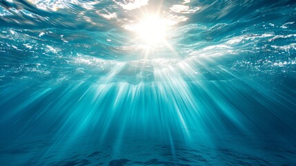 Poster - A beautiful blue ocean with sunlight shining through the water