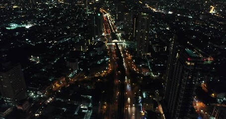 Canvas Print - Aerial view night city transport road office building with car movement trnasport industry