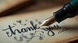 © vitanovski - Elegant close-up of a fountain pen writing thank you note