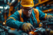 © juraj - Focused industrial worker tightening bolts on a heavy duty machine in a factory