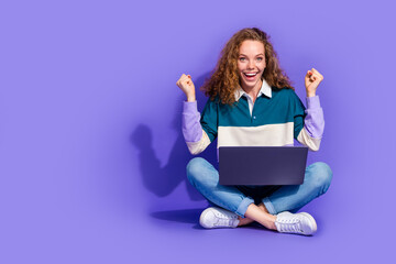 Sticker - Full size photo of nice young girl laptop raise fists isolated on violet color background