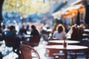 Blurred background of People sitting at tables in outdoor cafe, on bustling street. Relaxed atmosphere, featuring individuals enjoying coffee and casual conversation in lively city environment.