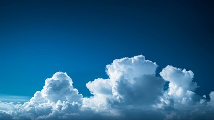 Wall Mural -  A blue sky backdrops a groupless planes in the foreground, encircled by clouds