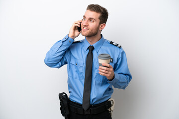 Young police caucasian man isolated on white background holding coffee to take away and a mobile