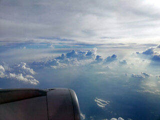 airplane travel in beautiful blue sky and clouds